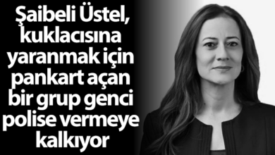 ozgur_gazete_kibris_dogus_derya_unal_ustel_pankart_polise_vermeye_kalkiyor_gencleri