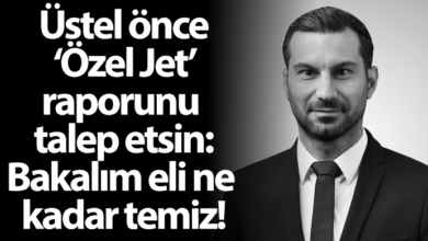 ozgur_gazete_kibris_urun_solyali_unal_ustel_pankart_polise_vermeye_kalkiyor_gencleri